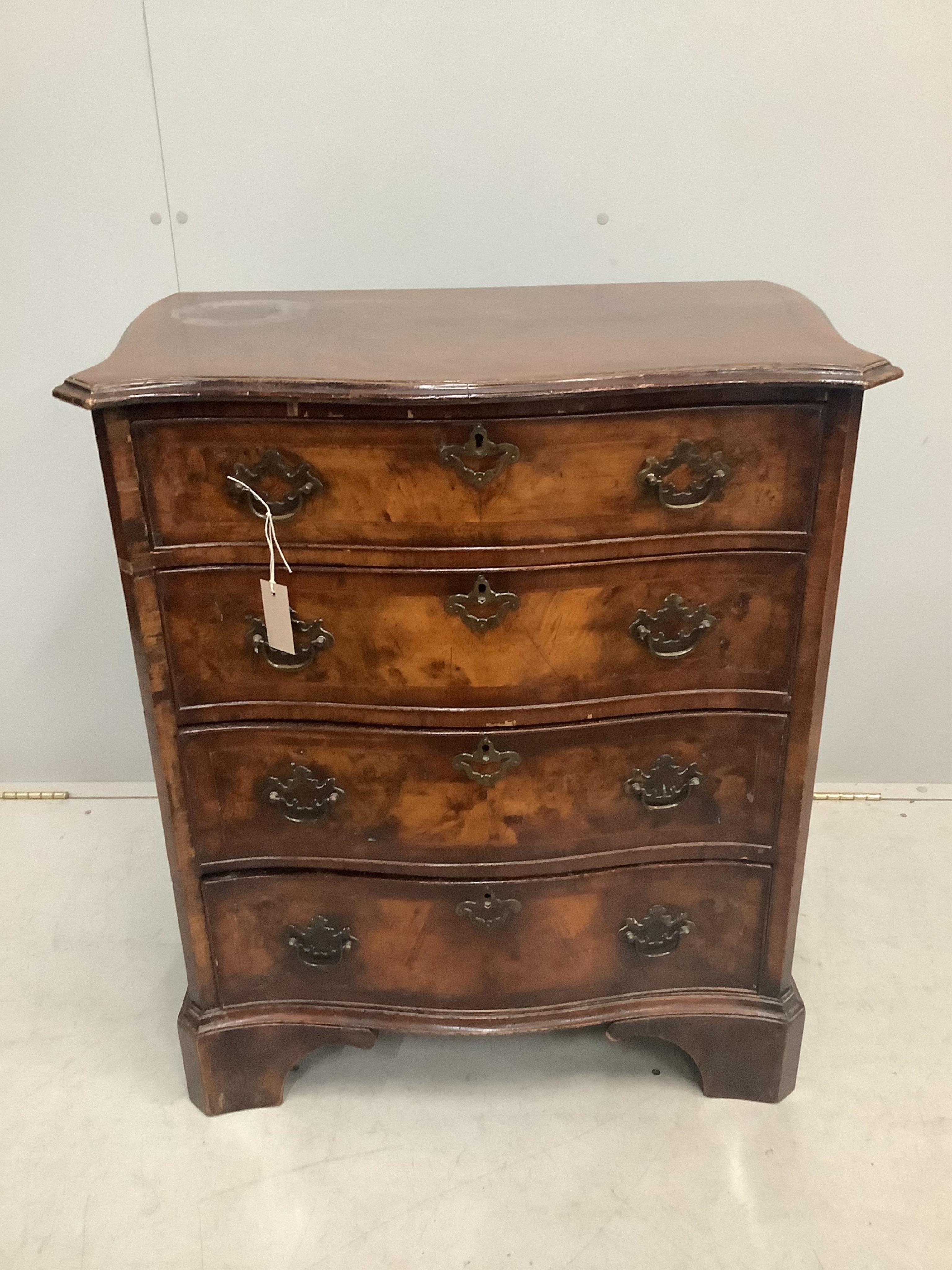 An early 20th century George I style banded walnut serpentine chest of drawers, width 73cm, depth 47cm, height 85cm